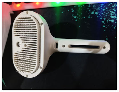 2-in-1 Self-Cleaning Pet Comb with Built-In Mist – Grooming Brush for Dogs & Cats